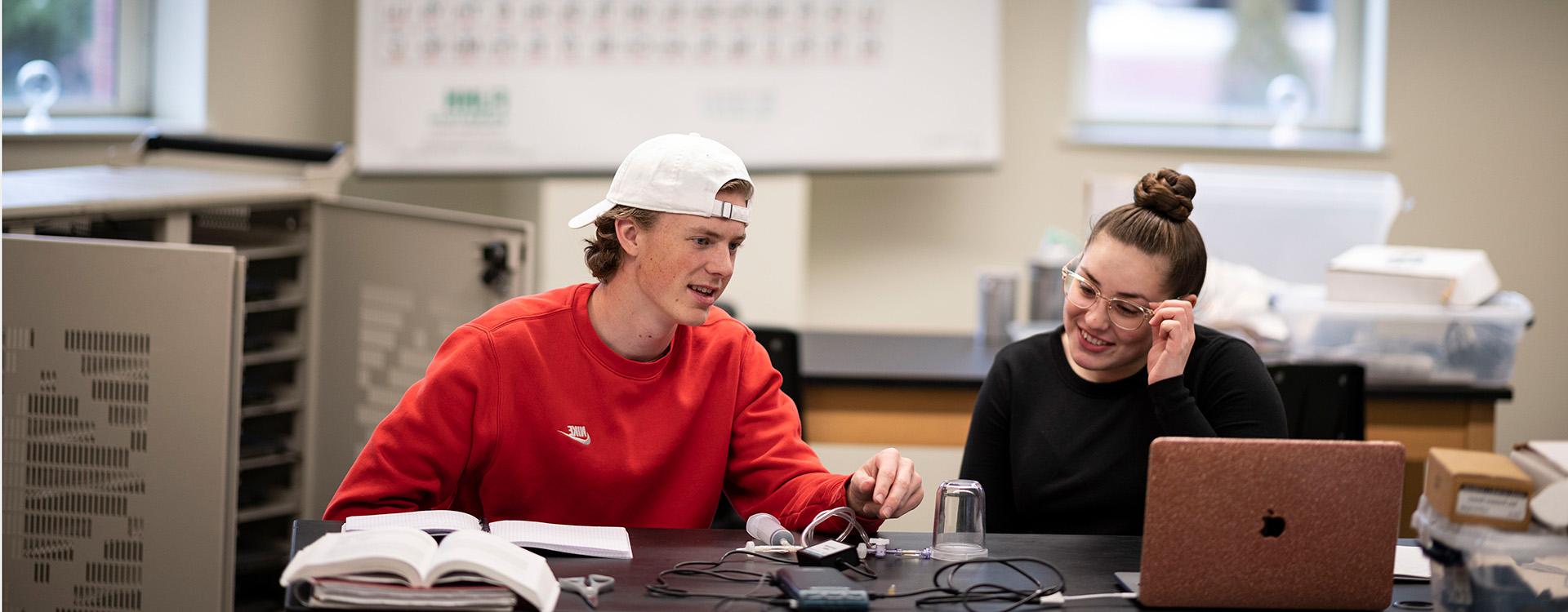 WLC students using equipment in physics lab